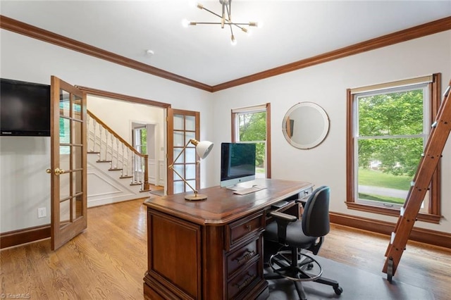641 Doe Run Dr, Kernersville, NC 27284 - home office with french doors, light wood-style floors, crown molding, plenty of natural light, and a chandelier