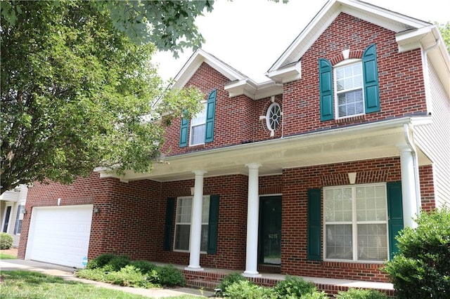 6215 Glen Way Dr, Winston-Salem, NC 27107 - traditional-style house featuring a porch and brick siding