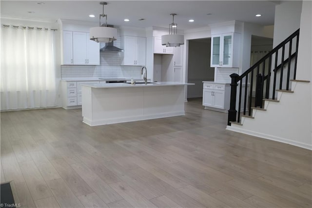 6215 Glen Way Dr, Winston-Salem, NC 27107 - kitchen with decorative backsplash, white cabinetry, light countertops, crown molding, and recessed lighting