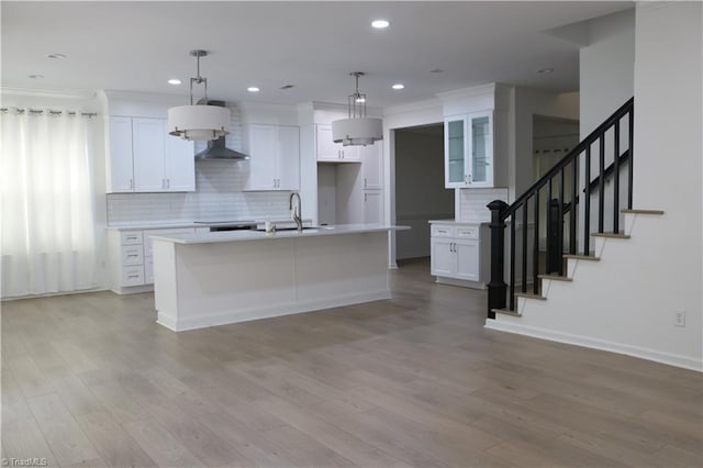 6215 Glen Way Dr, Winston-Salem, NC 27107 - kitchen featuring backsplash, light wood-style flooring, white cabinetry, recessed lighting, and crown molding