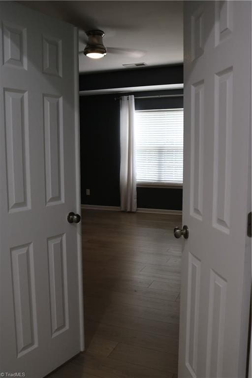 6215 Glen Way Dr, Winston-Salem, NC 27107 - corridor featuring baseboards and dark wood-type flooring