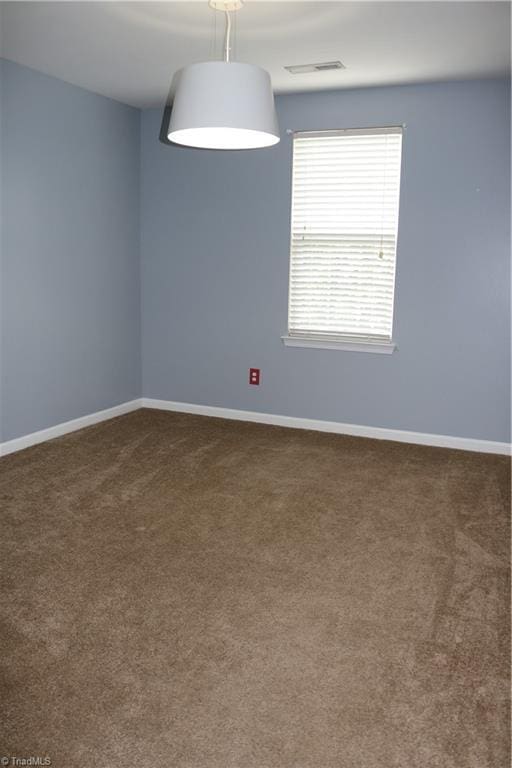 6215 Glen Way Dr, Winston-Salem, NC 27107 - empty room featuring dark colored carpet