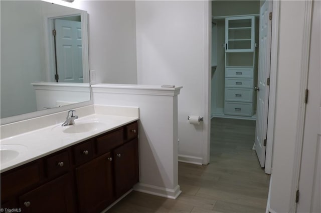 6215 Glen Way Dr, Winston-Salem, NC 27107 - bathroom featuring double vanity and wood finished floors