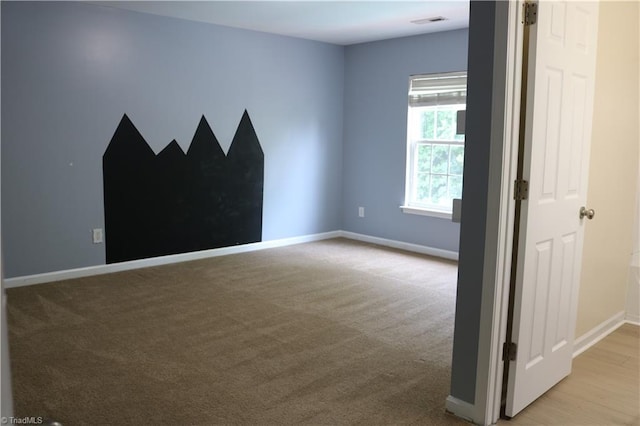 6215 Glen Way Dr, Winston-Salem, NC 27107 - carpeted empty room with baseboards