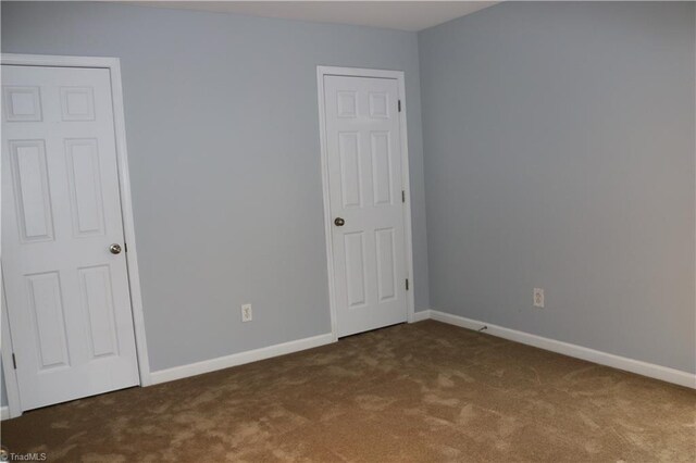 6215 Glen Way Dr, Winston-Salem, NC 27107 - unfurnished bedroom featuring carpet floors and baseboards