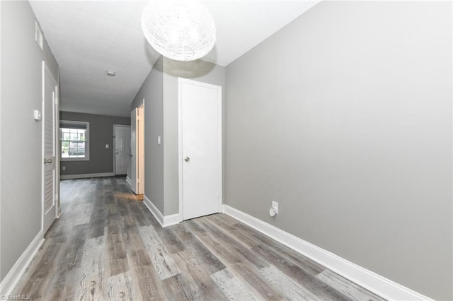 311 Salisbury St Unit 50, Kernersville, NC 27284 - hall featuring wood finished floors and baseboards