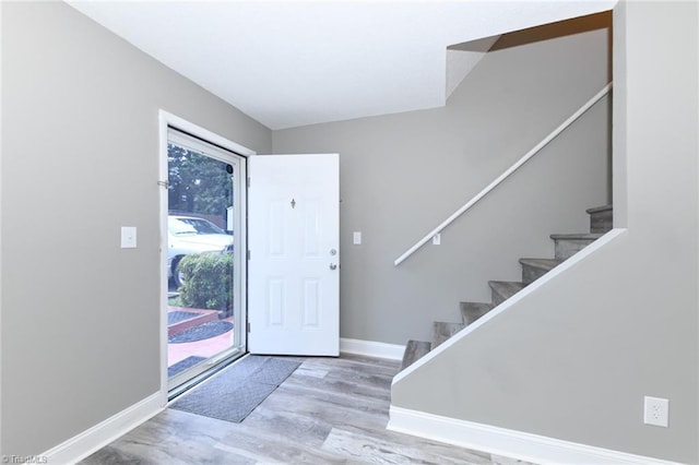 311 Salisbury St Unit 50, Kernersville, NC 27284 - entrance foyer featuring wood finished floors, stairway, and baseboards