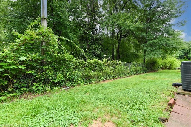 311 Salisbury St Unit 50, Kernersville, NC 27284 - view of yard featuring central AC unit