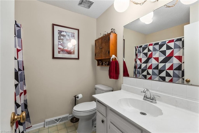 213 Timmys Ln, King, NC 27021 - bathroom with vanity, tile patterned floors, a textured ceiling, and a shower with shower curtain