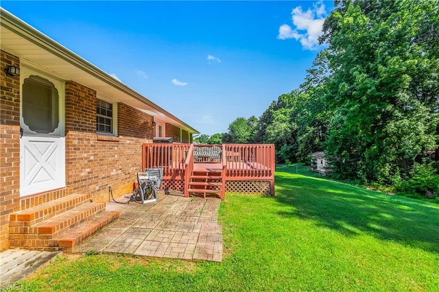 213 Timmys Ln, King, NC 27021 - view of green lawn with a patio and a wooden deck