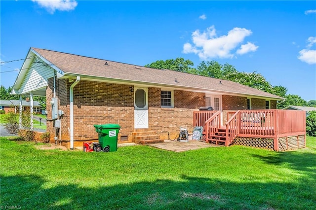 213 Timmys Ln, King, NC 27021 - rear view of property with brick siding, a wooden deck, a yard, and entry steps