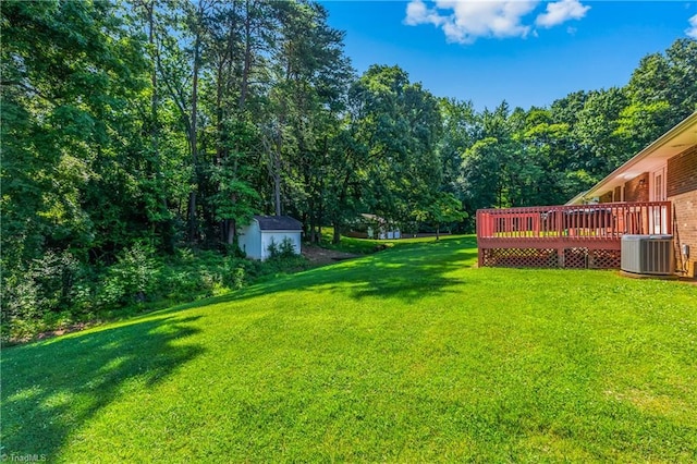 213 Timmys Ln, King, NC 27021 - view of grassy yard featuring a shed and a wooden deck