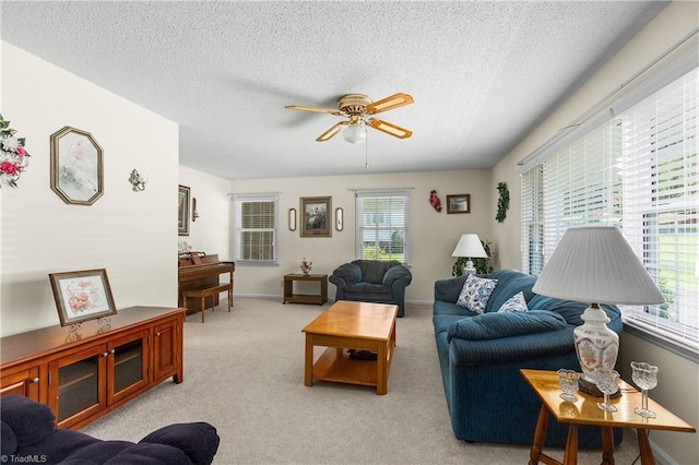 213 Timmys Ln, King, NC 27021 - carpeted living area featuring ceiling fan, healthy amount of natural light, and a textured ceiling