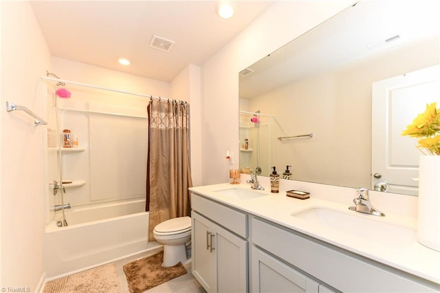 full bathroom with shower / tub combo, vanity, toilet, and tile patterned floors