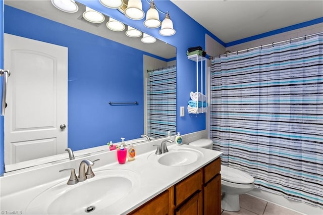 bathroom with toilet, a shower with curtain, vanity, and tile patterned flooring