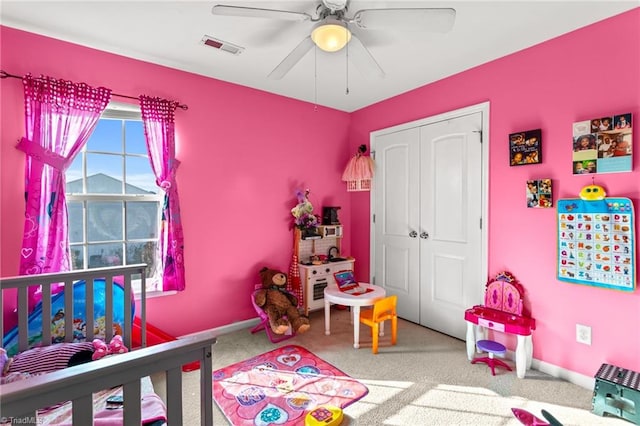 bedroom featuring a closet, carpet, and ceiling fan