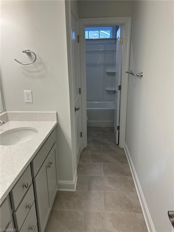 bathroom featuring vanity and shower / bathtub combination