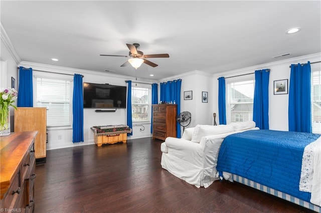 bedroom with recessed lighting, multiple windows, wood finished floors, and crown molding