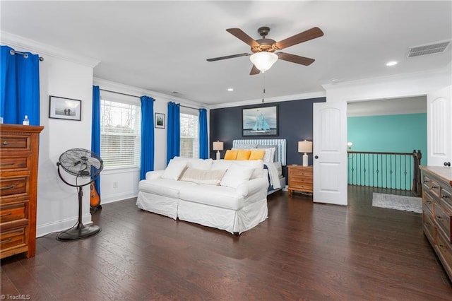 bedroom featuring baseboards, dark wood-style floors, visible vents, and ornamental molding