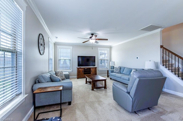 living area with light carpet, visible vents, baseboards, stairs, and ornamental molding