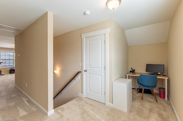 office space featuring baseboards, visible vents, and carpet flooring