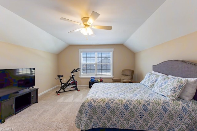 bedroom featuring light carpet, visible vents, baseboards, a ceiling fan, and lofted ceiling