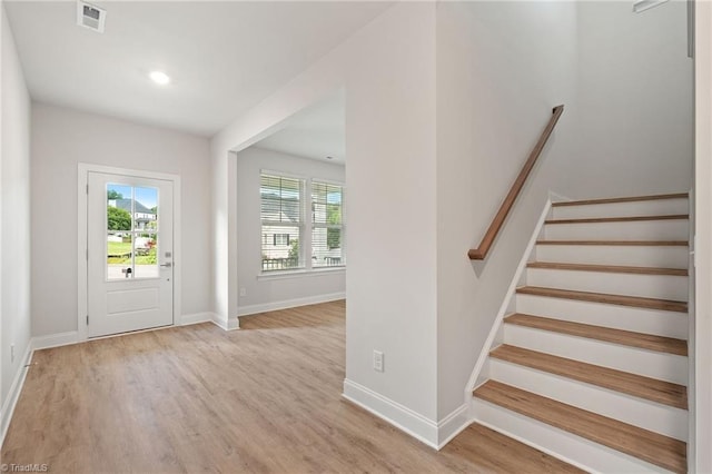 5421 High Valley Ln, Winston-Salem, NC 27104 - foyer entrance featuring light wood finished floors and stairs