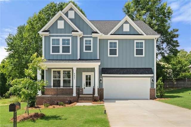 5421 High Valley Ln, Winston-Salem, NC 27104 - craftsman house with a porch, driveway, an attached garage, roof with shingles, and board and batten siding