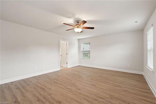 5421 High Valley Ln, Winston-Salem, NC 27104 - empty room featuring wood finished floors and ceiling fan