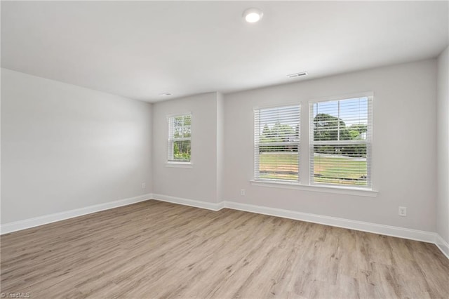 5421 High Valley Ln, Winston-Salem, NC 27104 - empty room with light wood-style floors and baseboards