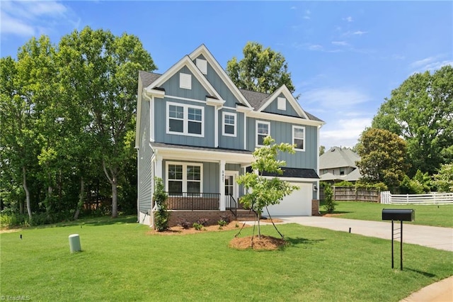 5421 High Valley Ln, Winston-Salem, NC 27104 - craftsman house featuring a garage, board and batten siding, concrete driveway, and covered porch