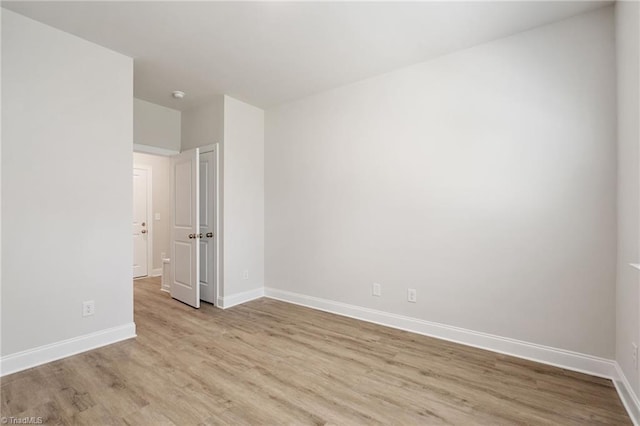 5421 High Valley Ln, Winston-Salem, NC 27104 - spare room featuring wood finished floors and a smoke detector