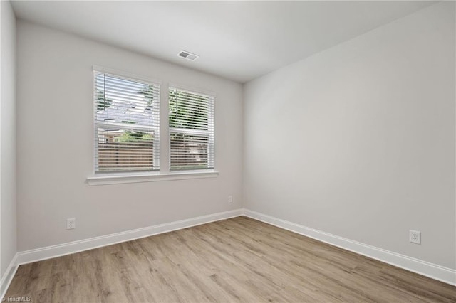 5421 High Valley Ln, Winston-Salem, NC 27104 - empty room featuring wood finished floors and baseboards