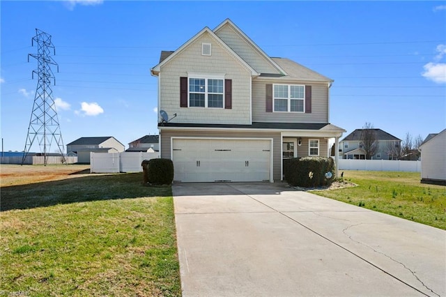 view of front facade with a garage, fence, a front lawn, and concrete driveway