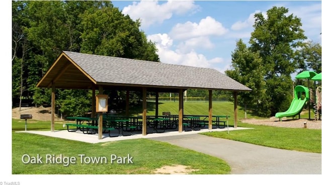 view of community featuring a gazebo, a yard, and playground community