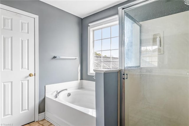 bathroom with tile patterned floors and plus walk in shower