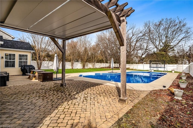 view of swimming pool featuring a pergola and a patio area