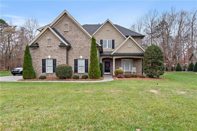 craftsman-style home with a front lawn