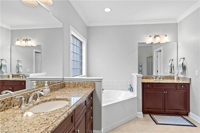 bathroom featuring ornamental molding, tile patterned floors, vanity, and a bathtub