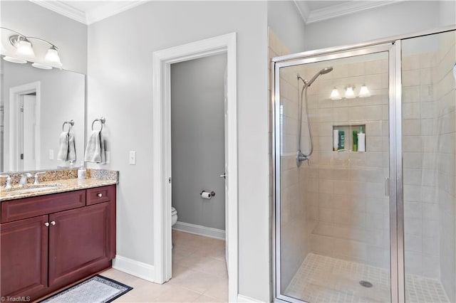 bathroom with a shower with door, crown molding, vanity, and toilet