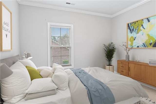 carpeted bedroom featuring crown molding