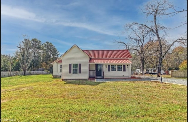 view of front of home with a front yard