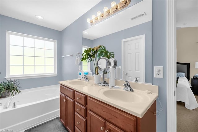 3502 Quarry Ct, High Point, NC 27265 - ensuite bathroom with double vanity and a bath