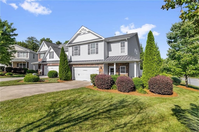 3502 Quarry Ct, High Point, NC 27265 - view of front of property featuring a standing seam roof, concrete driveway, an attached garage, and a front yard