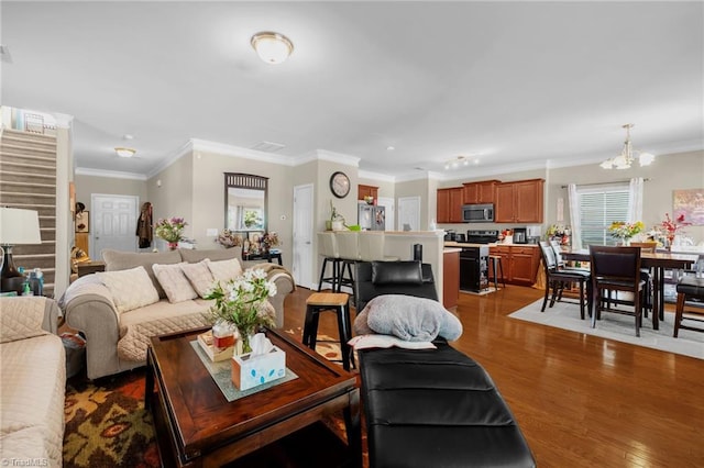 3502 Quarry Ct, High Point, NC 27265 - living area featuring dark wood finished floors, a chandelier, crown molding, and plenty of natural light