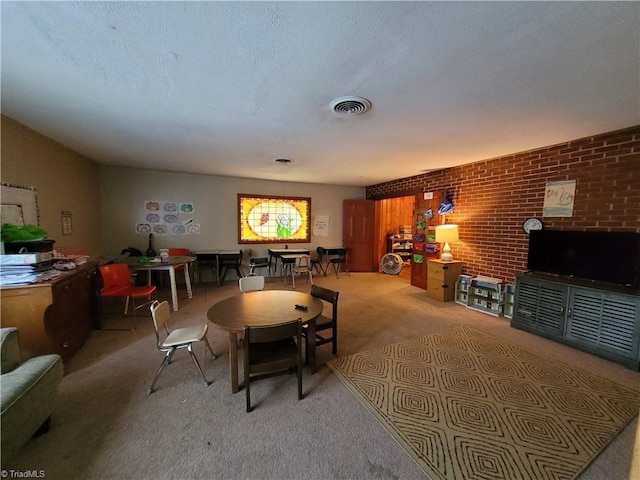 view of carpeted dining space