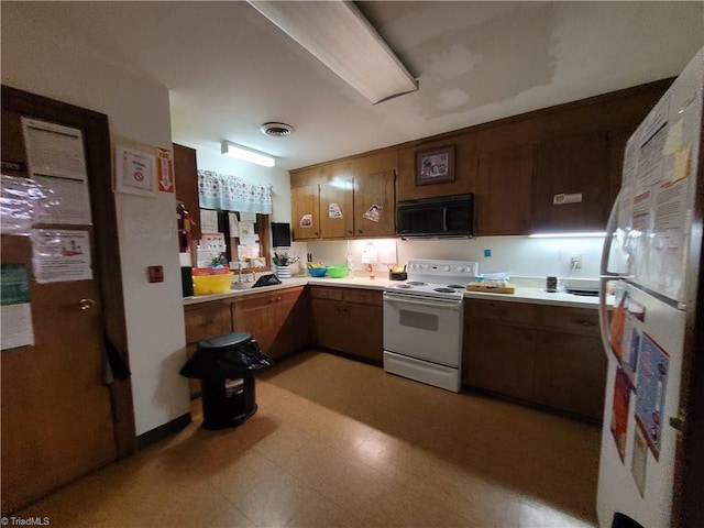 kitchen featuring white appliances