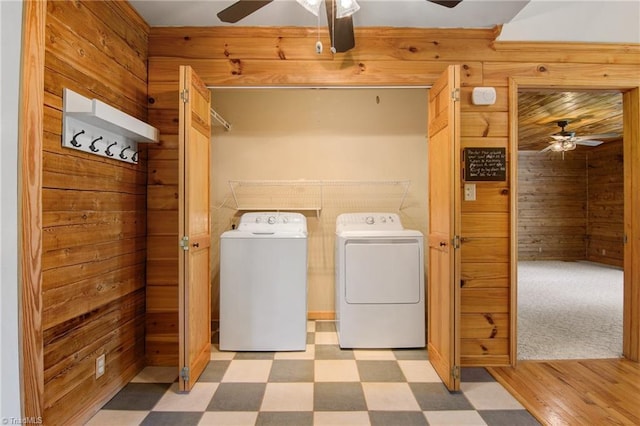 4962 Serenity Ln, Granite Falls, NC 28630 - washroom with a ceiling fan, washer and clothes dryer, wood walls, and light floors