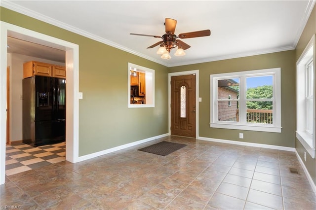 4962 Serenity Ln, Granite Falls, NC 28630 - entrance foyer featuring baseboards, crown molding, and a ceiling fan
