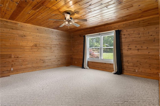 4962 Serenity Ln, Granite Falls, NC 28630 - carpeted empty room with wooden ceiling, a ceiling fan, and wooden walls